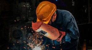 Man working or steel fabrication